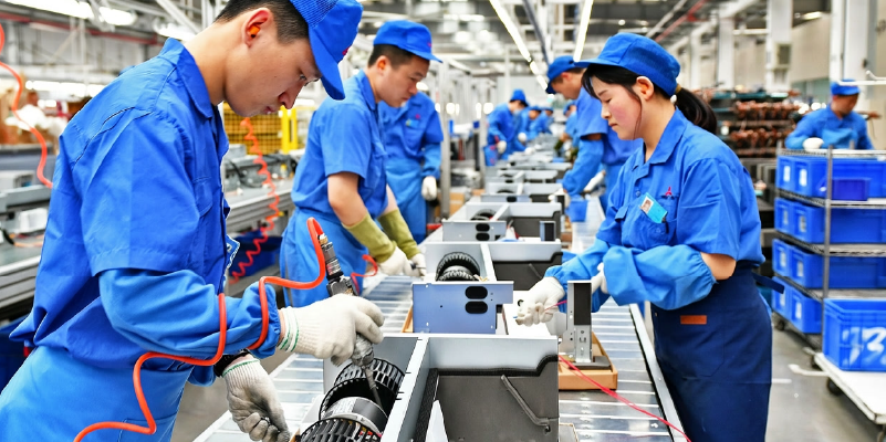 Chinese manufacturing facility with production lines and workers assembling consumer products
