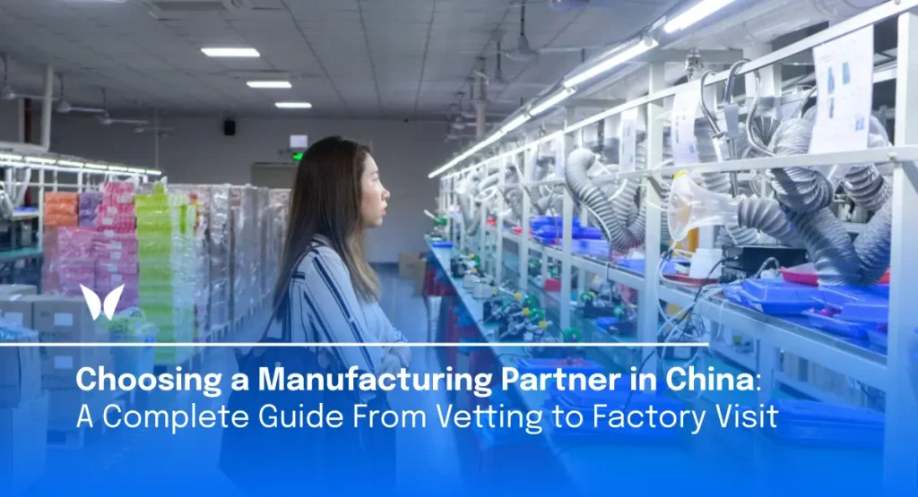 A woman inspecting an automated production line during a factory visit, illustrating what founders should look for when evaluating a manufacturing partner